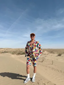 Quang Linh Vlogs Captivates Fans with Unique Fashion and Charismatic African Adventures - image 2