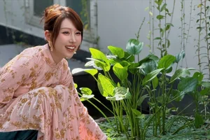 Singer Min Captivates in Traditional Ao Dai for the Lunar New Year - image 6