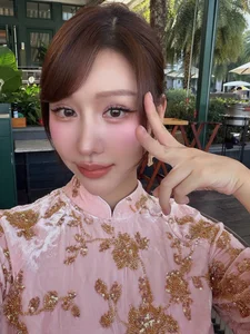 Singer Min Captivates in Traditional Ao Dai for the Lunar New Year - image 8