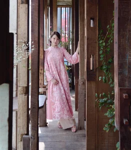 Singer Min Captivates in Traditional Ao Dai for the Lunar New Year - image 3