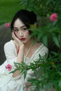 Elegant Woman in White Dress Amidst Lush Green Nature - image 15
