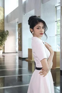 Runner-up Minh Kiên Shines on VTV: A Look at Her Radiant Style and Growing Career - image 10