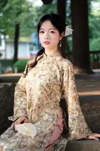 East Asian Traditional Beauty: Gentle Young Woman in Ao Dai with Elegant Wooden Fan - image 20