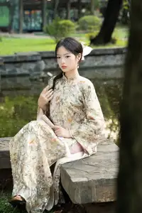 East Asian Traditional Beauty: Gentle Young Woman in Ao Dai with Elegant Wooden Fan - image 8