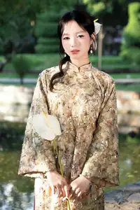 East Asian Traditional Beauty: Gentle Young Woman in Ao Dai with Elegant Wooden Fan - image 13