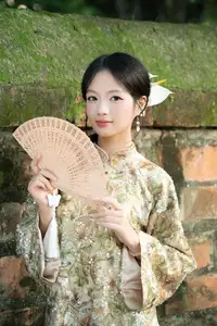 East Asian Traditional Beauty: Gentle Young Woman in Ao Dai with Elegant Wooden Fan - image 14
