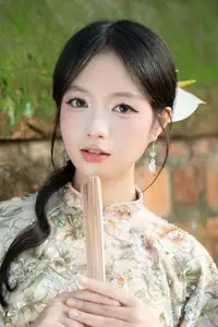 East Asian Traditional Beauty: Gentle Young Woman in Ao Dai with Elegant Wooden Fan - image 15