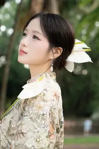 East Asian Traditional Beauty: Gentle Young Woman in Ao Dai with Elegant Wooden Fan - image 7