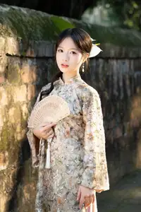 East Asian Traditional Beauty: Gentle Young Woman in Ao Dai with Elegant Wooden Fan - image 10