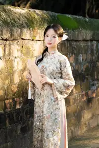 East Asian Traditional Beauty: Gentle Young Woman in Ao Dai with Elegant Wooden Fan - image 16