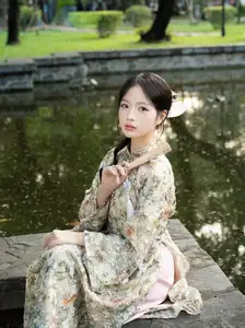 East Asian Traditional Beauty: Gentle Young Woman in Ao Dai with Elegant Wooden Fan - image 17
