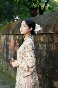 East Asian Traditional Beauty: Gentle Young Woman in Ao Dai with Elegant Wooden Fan - image 5