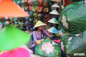 Elegant Vietnamese Ao Dai Fashion at the Ho Chi Minh City Calligraphy Street Festival - image 1