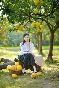 Gentle Girl in Pomelo Garden, Youthful Beauty Blending with Nature 17639840 - image 1