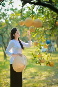 Gentle Girl in Pomelo Garden, Youthful Beauty Blending with Nature 17639840 - image 3