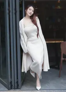 Discover the elegant charm of a gentle woman captured in a serene, thoughtful moment 176403855 - image 8