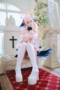 Pure Elegance: Coser RiNaiJiao as Koharu Shimoe in Blue Archive Wedding Dress (27P) - image 9