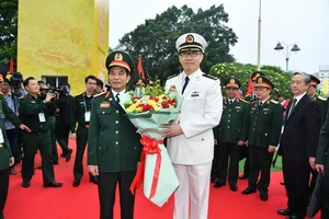Vietnam and China Defense Ministers Paint Border Landmark in Diplomatic Gesture - image 2