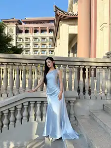 Miss Ý Nhi Radiates Elegance: A Vision in Her Sophisticated Evening Gown on Grand Ancient Stairs - image 1