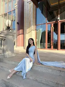 Miss Ý Nhi Radiates Elegance: A Vision in Her Sophisticated Evening Gown on Grand Ancient Stairs - image 2