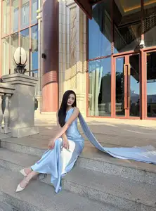 Miss Ý Nhi Radiates Elegance: A Vision in Her Sophisticated Evening Gown on Grand Ancient Stairs - image 0
