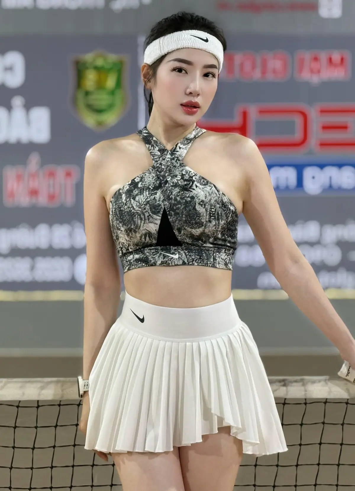 Loan Barbie: Running Nurse Stuns with Alluring Christmas Look and Radiant Charm