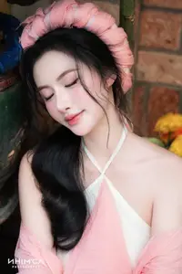 Gentle Beauty of a Vietnamese Girl in Elegant Traditional Attire - image 2