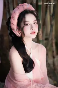 Gentle Beauty of a Vietnamese Girl in Elegant Traditional Attire - image 5