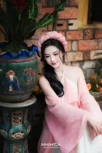 Gentle Beauty of a Vietnamese Girl in Elegant Traditional Attire - image 0
