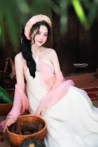 Gentle Beauty of a Vietnamese Girl in Elegant Traditional Attire - image 18