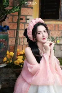 Gentle Beauty of a Vietnamese Girl in Elegant Traditional Attire - image 16
