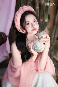 Gentle Beauty of a Vietnamese Girl in Elegant Traditional Attire - image 17