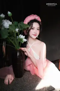 Gentle Beauty of a Vietnamese Girl in Elegant Traditional Attire - image 11