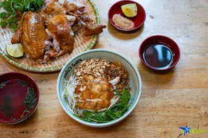 Discover the Famous Roasted Chicken Pho Stall in Hanoi Selling Hundreds Daily - image 9