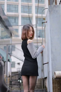Xiaoliu in the Rain: Atmospheric IESS Photography Showcasing Elegant Black Silk Hosiery in a Moody Urban Setting - image 55