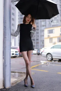 Xiaoliu in the Rain: Atmospheric IESS Photography Showcasing Elegant Black Silk Hosiery in a Moody Urban Setting - image 9