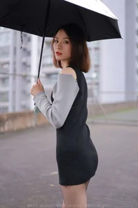 Xiaoliu in the Rain: Atmospheric IESS Photography Showcasing Elegant Black Silk Hosiery in a Moody Urban Setting - image 57