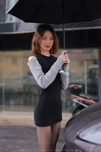 Xiaoliu in the Rain: Atmospheric IESS Photography Showcasing Elegant Black Silk Hosiery in a Moody Urban Setting - image 36