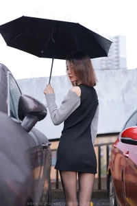Xiaoliu in the Rain: Atmospheric IESS Photography Showcasing Elegant Black Silk Hosiery in a Moody Urban Setting - image 37