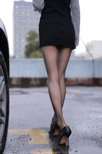 Xiaoliu in the Rain: Atmospheric IESS Photography Showcasing Elegant Black Silk Hosiery in a Moody Urban Setting - image 60