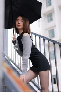 Xiaoliu in the Rain: Atmospheric IESS Photography Showcasing Elegant Black Silk Hosiery in a Moody Urban Setting - image 35