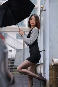 Xiaoliu in the Rain: Atmospheric IESS Photography Showcasing Elegant Black Silk Hosiery in a Moody Urban Setting - image 74