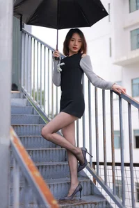 Xiaoliu in the Rain: Atmospheric IESS Photography Showcasing Elegant Black Silk Hosiery in a Moody Urban Setting - image 10