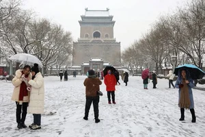 Resilience Amidst the Chill: Chinese Citizens Battle Record-Breaking Cold Wave - image 9