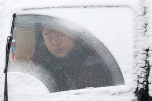 Resilience Amidst the Chill: Chinese Citizens Battle Record-Breaking Cold Wave - image 5