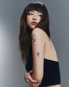Exploring the Aesthetic Appeal of Linh Ka’s Trendy Tiny Tattoos - image 5