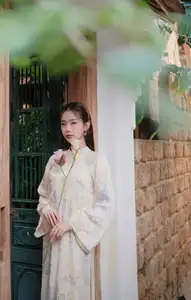 Captivating Asian Beauty: Elegant Woman Embracing Delicate Flowers - image 5