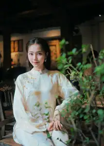 Captivating Asian Beauty: Elegant Woman Embracing Delicate Flowers - image 6