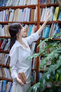 Lilly Luta's Timeless Beauty: Radiating Elegance in a Classic White Shirt - image 1