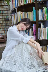 Lilly Luta's Timeless Beauty: Radiating Elegance in a Classic White Shirt - image 7